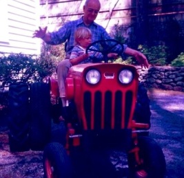 My father lets his grandson Ben take the wheel, circa 1988.